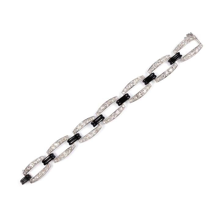Art Deco diamond and black enamel open link bracelet, retailed by Fontana,